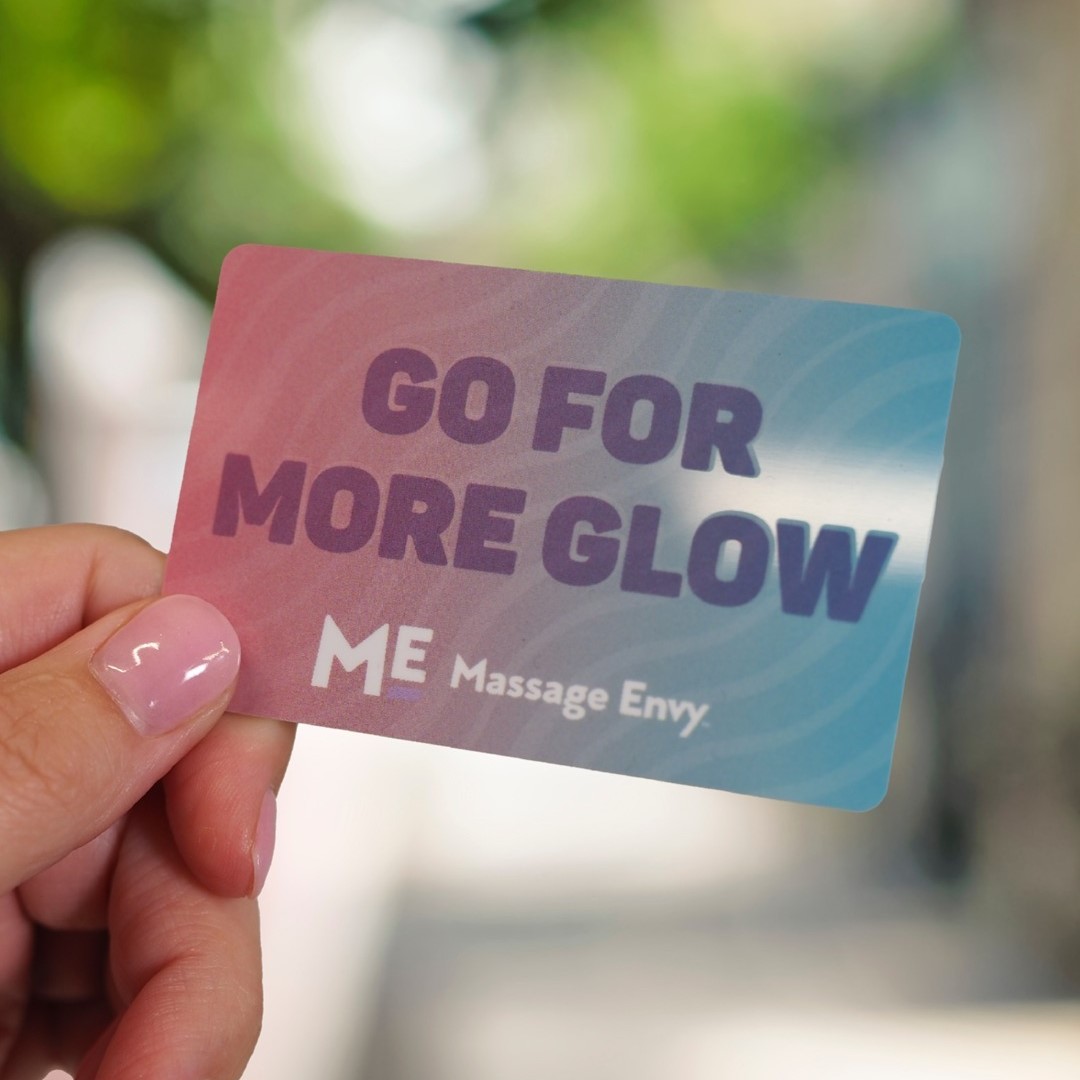MASSAGE ENVY a Massage Envy gift card that reads Go For More Glow ME Massage Envy